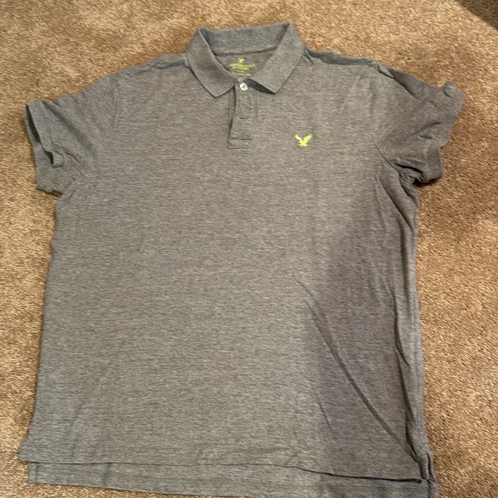 American Eagle grey polo shirt.